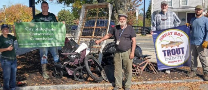 After a day's hard work, the Cocheco River runs through it - with far less junk!