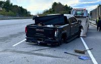 Mass. man arrested after throwing gun while troopers probe I-93 crash