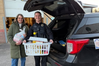 Dover Police, volunteers dole out food baskets for community's most needy