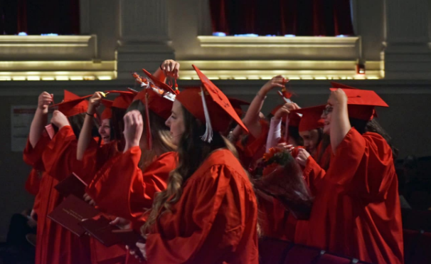 Adult high school diplomas awarded to an energized, exulting throng 42 strong