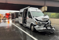 Car stopping in open toll lane leads to 5-vehicle crash involving 2 tractor trailers