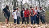 Liberty Mutual vols help with weeding out invasive flora on Teneriffe Mountain