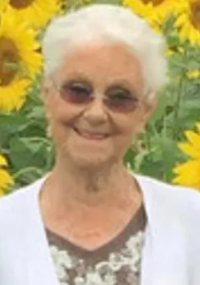 June Canney ... enjoyed gardening; at 88