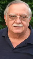 Richard L. Dupuis ... enjoyed gardening; at 77