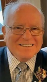 The Rev. Les Pettit ... enjoyed umpiring; at 81