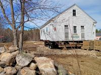GETTING CLOSER TO HOME: Historic 1-room schoolhouse's journey almost at end 