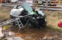 Driver injured in Farmington Road rollover, entrapment 