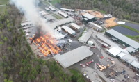 Multi-agency probe continues into cause of deadly lumberyard fire 
