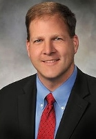 Gov. Chris T. Sununu has earned a second term